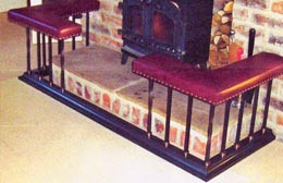 Burnished steel fender seat – wood burner